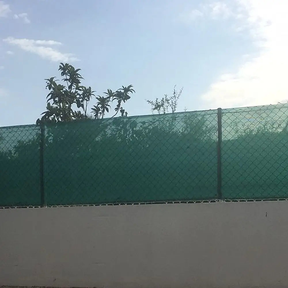 shade netting on a wall used as a fence